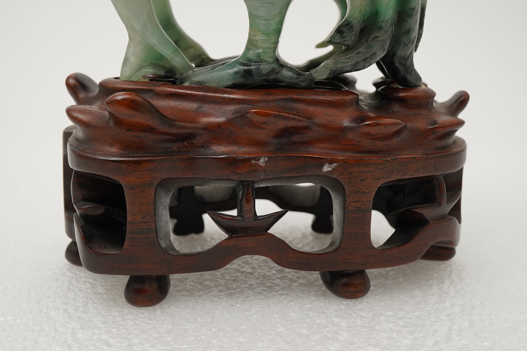 A Chinese jadeite figure of Xi Wangmu riding on a phoenix, late 19th/early 20th century